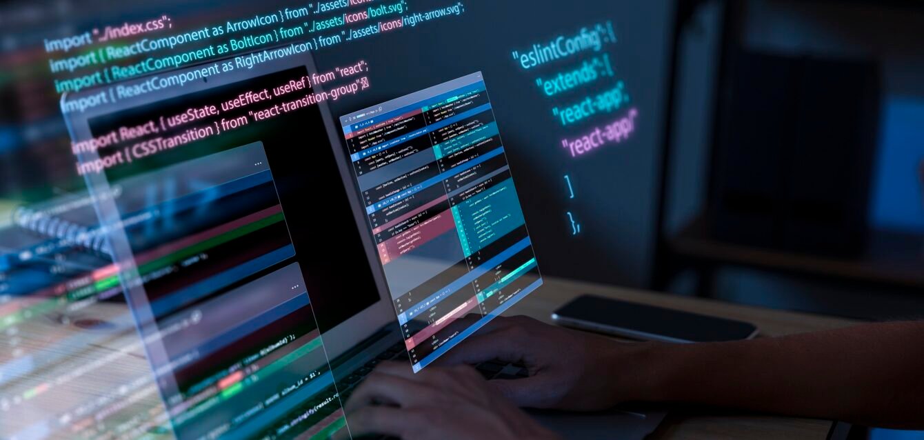 programming-background-with-person-working-with-codes-computer CapacitorJS